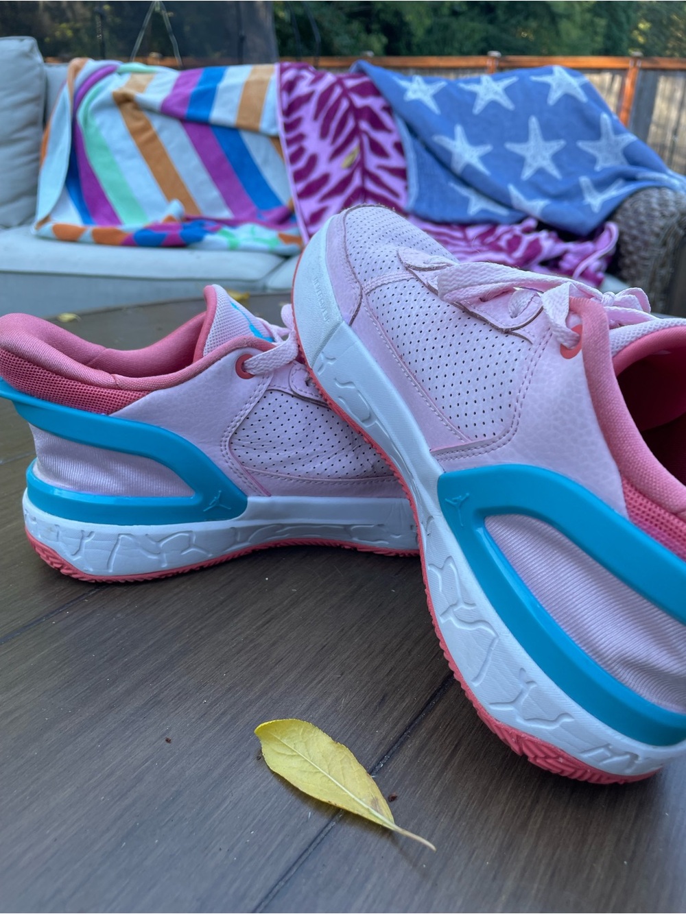 Jordan Kids Pink Sneakers with Teal Heel Accent
